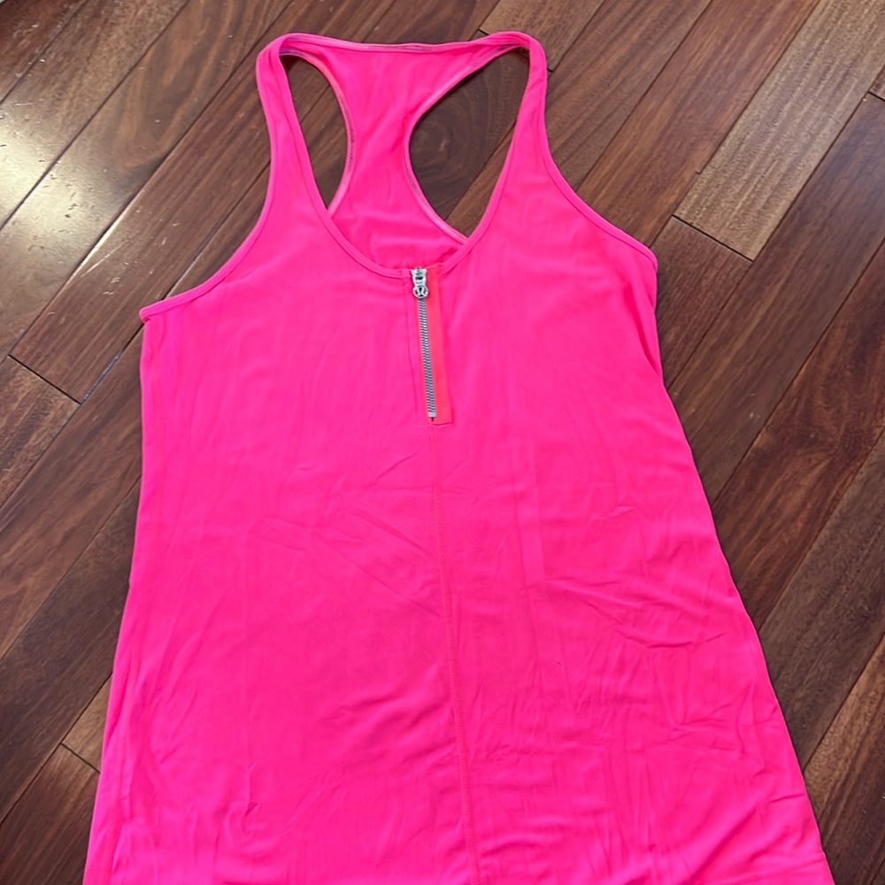 Neon pink lululemon tank likely size 12.